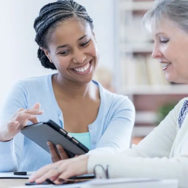 Associate helping a client with their account