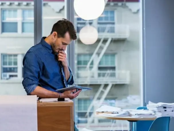 Businessman reviewing his company's deriviatives options