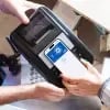 Smartphone getting used to pay for a transaction through a mobile wallet