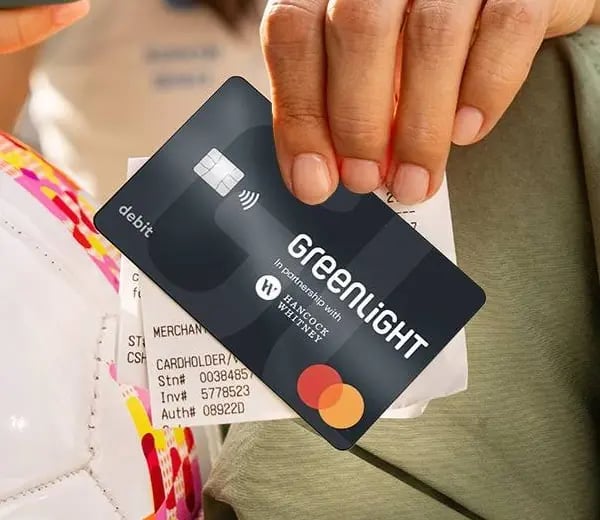Greenlight debit card for kids with a receipt