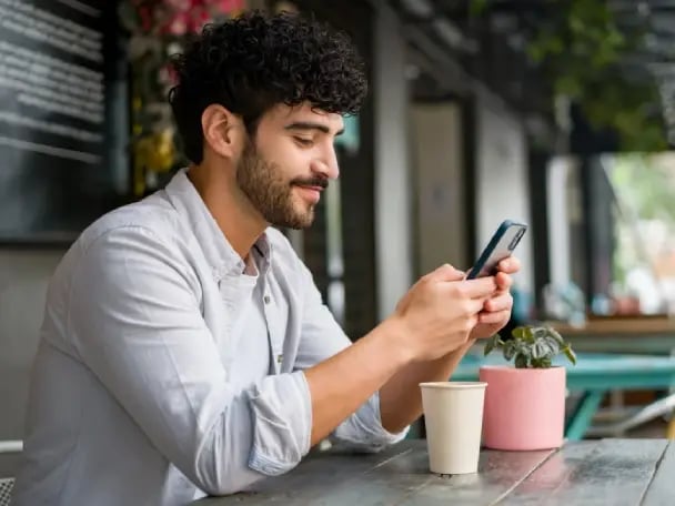 Man receiving his paycheck early via Early Pay