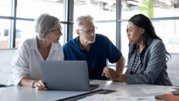 Couple working with their financial planner