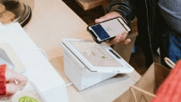 Business using POS system to process transactions