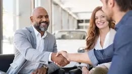 Business owner discussing his options for selling with advisors