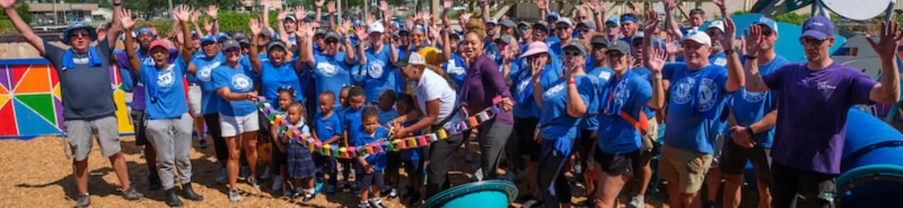 Hancock Whitney team celebrates the opening of a new community playground