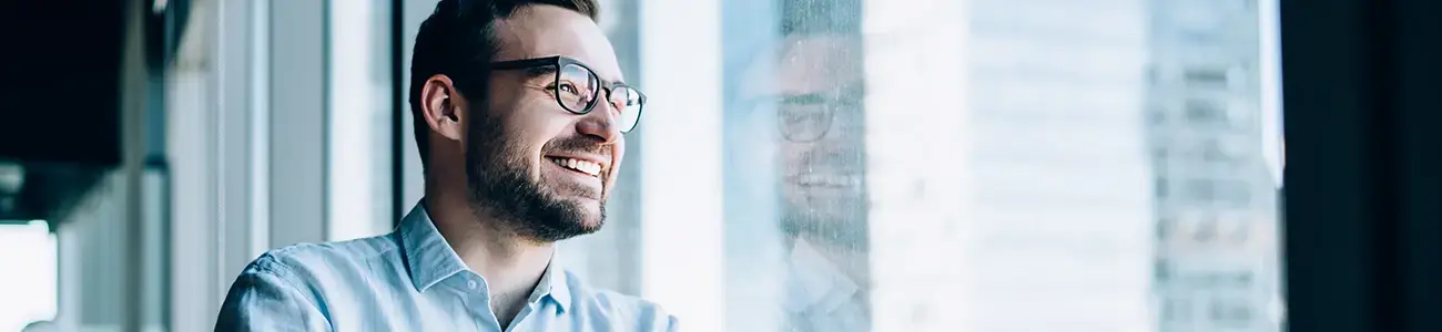 Businessman happy with his award-winning bank