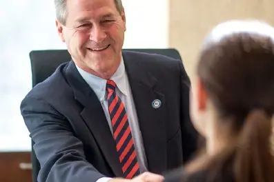 Commercial banker finalizing a commercial loan with a business owner
