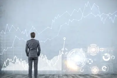 Businessman considering what to do about interest rate volatility
