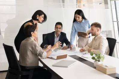 Corporate team discussing securities underwriting