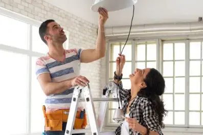 Couple making home repairs after applying for a HELOC