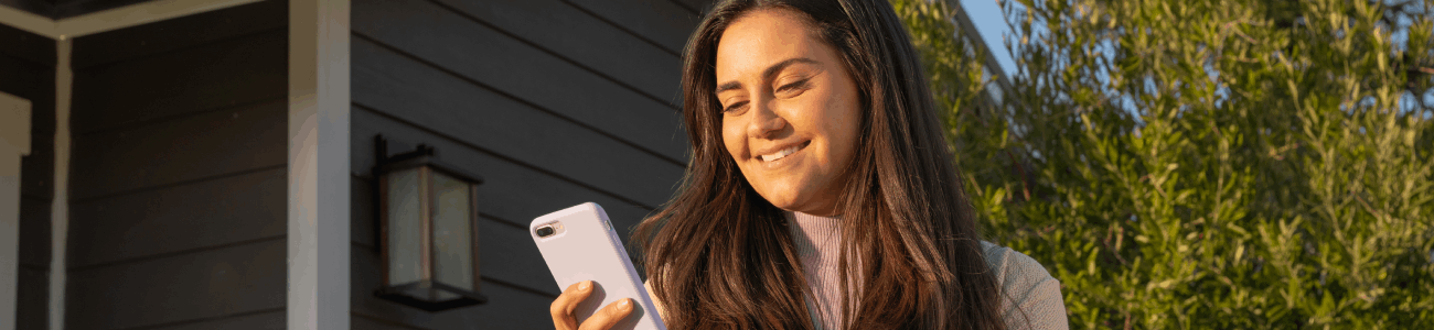 Woman using Zelle to receive money from a friend.